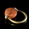 A PHOENICIO - RING WITH A CARNELIAN SCARABOID, 7TH-8TH CENTURY BC
