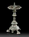 A BYZANTINE BRONZE CANDLESTICK, CIRCA 5TH-6TH CENTURY A.D.
