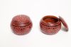 Dark patinated wooden go-board with two nicely carved zelkova-wooden boxes