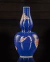 A Chinese blue ground double-gourd vase