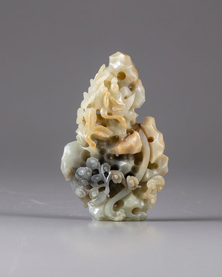 A Chinese pale celadon jade mountain