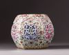 A CHINESE CELADON GROUND FAMILLE ROSE PORCELAIN PILLOW, LATE QING DYNASTY (1644-1911)