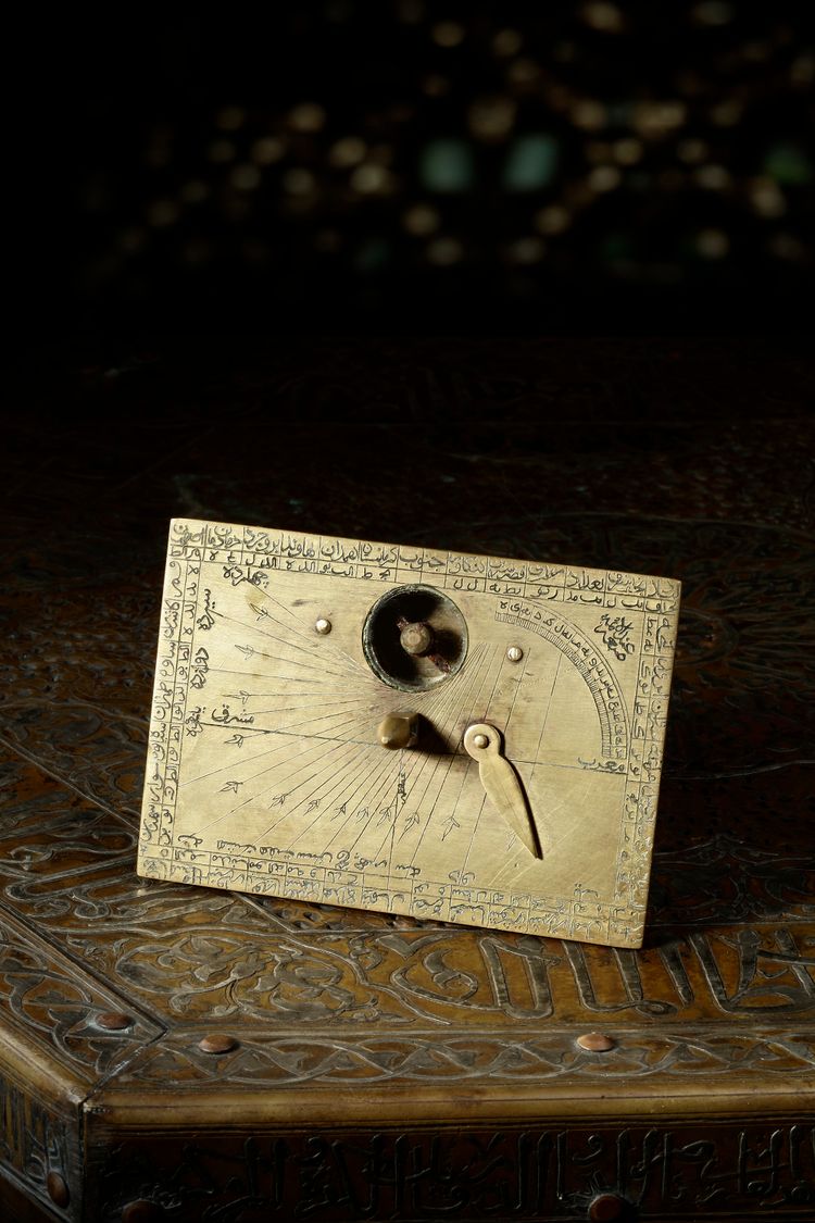 A SAFAVID HORIZONTAL DIAL AND QIBLA INDICATOR, ATTRIBUTED TO “ABD-AL-AIMMAH", PERSIA,