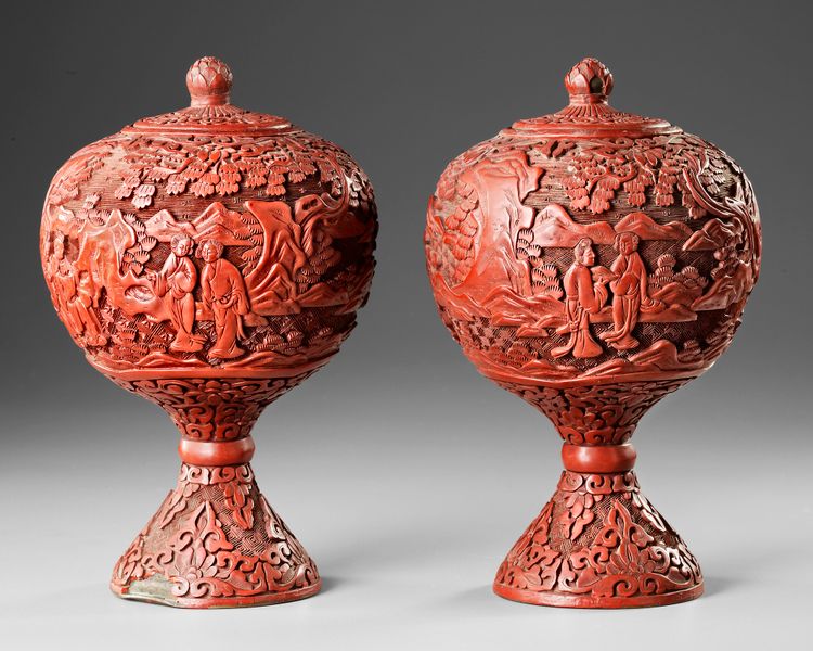 TWO CARVED CINNABAR LACQUER STEM-BOWLS AND COVERS, 19TH-20TH CENTURY