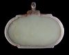 AN OVAL SAFAVID JADE TALISMANIC PENDANT