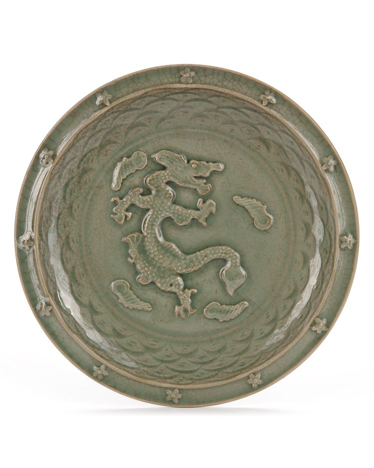 A CHINESE LONGQUAN CELADON MOULDED DRAGON DISH, MING DYNASTY (1368-1644)