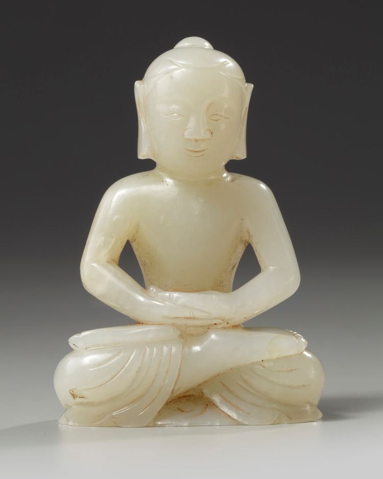 A Chinese white jade Shakyamuni
