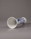 A CHINESE BLUE AND WHITE BEAKER VASE, 20TH CENTURY