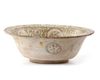 AN ABBASID UNGLAZED SLIP-PAINTED POTTERY BOWL, MESOPOTAMIA, 9TH CENTURY