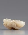 A CHINESE JADE LOTUS CARVING