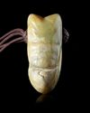 A CHINESE JADE PIG-DRAGON HOOK PENDANT, 20TH CENTURY