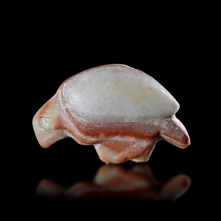 A STAMP SEAL IN THE FORM OF A VULTURE, NEAR EASTERN, 3RD MILLENNIUM BC