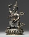 A Tibetan bronze figure of Vajrapani with stand