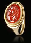 A ROMAN CARNELIAN INTAGLIO WITH GOLD RING, CIRCA 2ND-3RD CENTURY A.D.