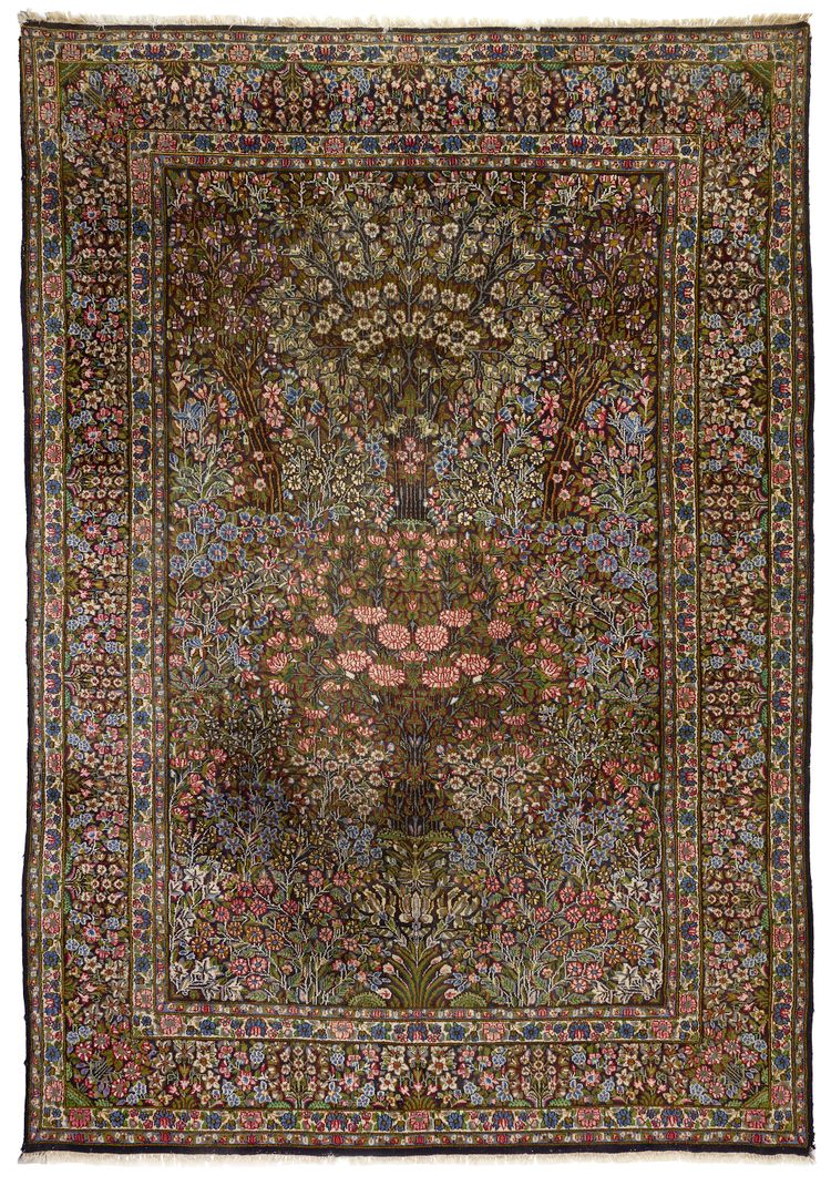 A KIRMAN RAWER CARPET