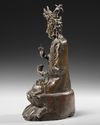 A CHINESE BRONZE FIGURE OF GUANYIN, CIRCA 1500
