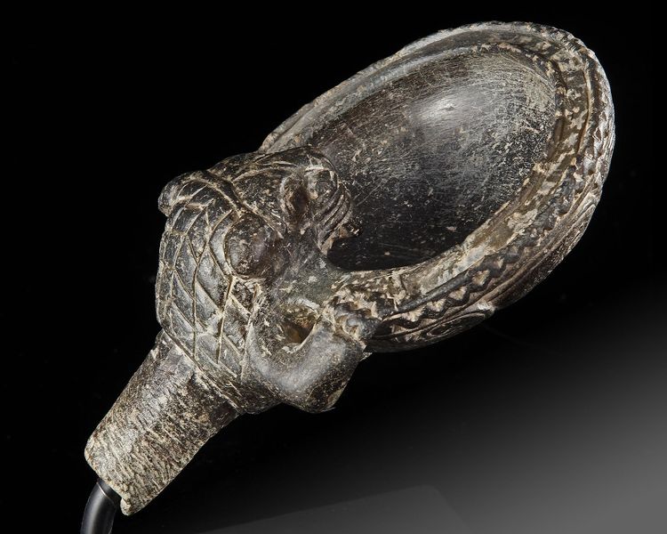 A WESTERN ASIATIC CHLORITE LIBATION BOWL, CIRCA 9TH-8TH CENTURY B.C.