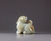 A Chinese celadon jade ‘twin qilin’ carving