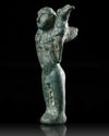 A WESTERN ASIATIC BRONZE STATUETTE OF MAN CARRYING AN ANIMAL, CIRCA 3RD MILLENNIUM B.C.