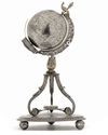 AN OTTOMAN SILVER, NIELLOED AND ENGRAVED GLOBE CLOCK BEARING THE TUGHRA OF SULTAN ABDULHAMID II TURKEY, 19TH CENTURY