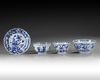 Three Chinese blue and white bowls and a dish