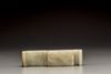 A celadon jade sword slide