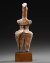 AN AMLASH TERRACOTTA STEATOPHYGOUS FIGURE, CIRCA EARLY 1ST MILLENIUM B.C.