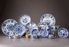A group of 19 Chinese blue and white cups, saucers and a bowl