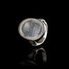 A PERSIAN CRYSTAL ROCK CARVED SILVER RING, 19TH CENTURY
