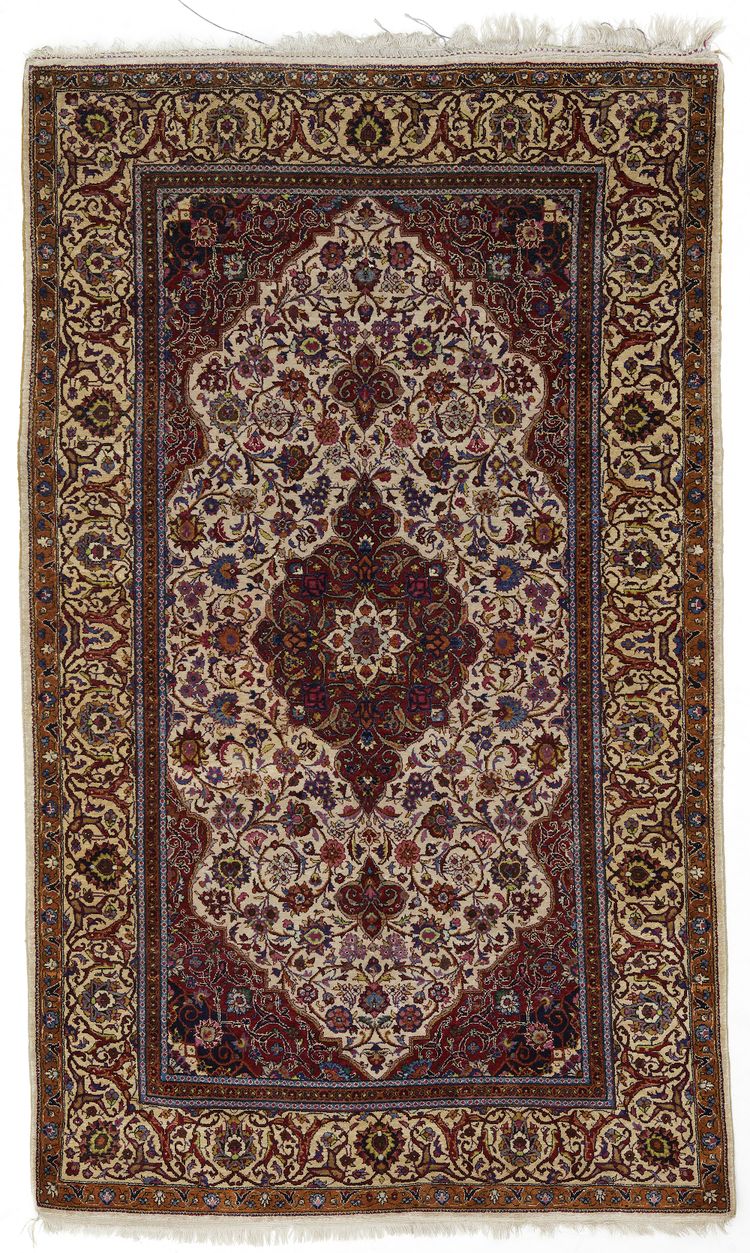A SILK KASHAN RUG