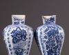 Two Chinese blue and white vases with covers