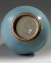 A CHINESE BLUE-GROUND CRACKLE-GLAZED BOTTLE VASE, CHINA, 19TH-20TH CENTURY