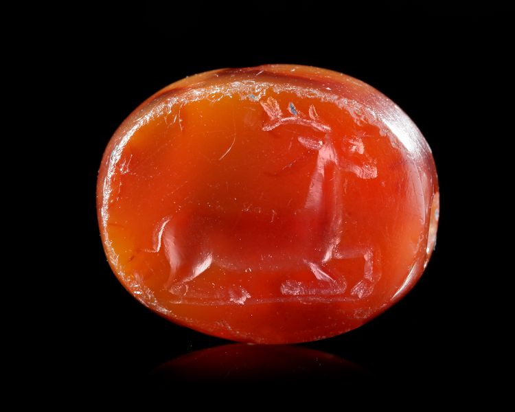AN AGATE SCARABOID EAST GREEK WITH A STAG, CIRCA 500 BC
