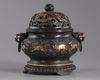 A CHINESE PARCEL-GILT BRONZE 'SEA CREATURES' CENSER, COVER AND STAND