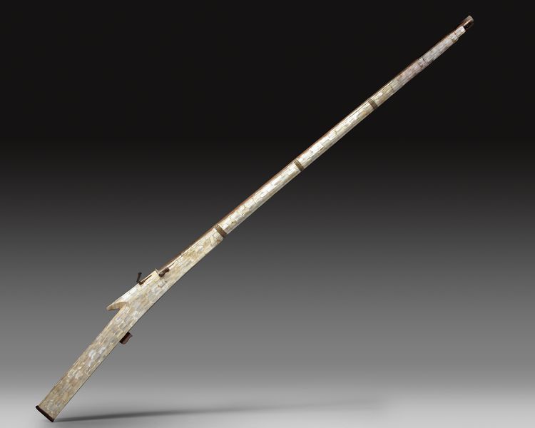 AN OTTOMAN MOTHER-OF-PEARL INLAID MIQUELET GUN