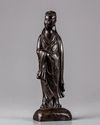 A Chinese bronze figure of a lady