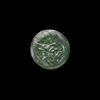 AN EARLY ISLAMIC GLASS WEIGHT OF HALF DIRHAM