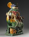 A SANCAI GLAZED FU DOG, CHINA, 20TH CENTURY