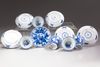 SIX CHINESE BLUE AND WHITE SAUCERS AND FIVE CUPS