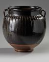 A Chinese brown-glazed ribbed jar