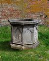 A CARVED LIMESTONE WELLHEAD, LATE 19TH CENTURY
