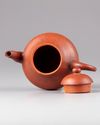 A Chinese Yixing teapot and cover