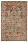 AN ANTIQUE KIRMAN PRAYER RUG