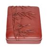 A Japanese red lacquered Kamakurabori writing box (suzuribako) with rounded corners