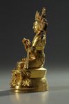 A Sino-Tibetan gilt bronze figure of Vajradhara