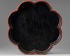A LARGE CHINESE CINNABAR LACQUER FLORIFORM BOX AND COVER, QING DYNASTY (1644-1911)