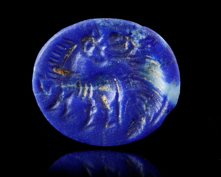 A LAPIS LAZULI INTAGLIO WITH A HORSE, SASSANIAN, 3RD-4TH CENTURY AD