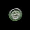 AN EARLY ISLAMIC GLASS WEIGHT OF HALF DIRHAM, 10TH-11TH CENTURY