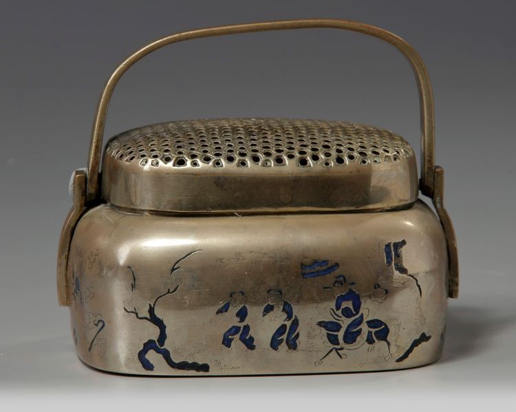 A Chinese brass 'narrative' hand warmer