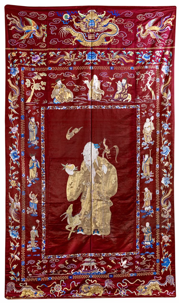 A CHINESE RED-GROUND SILK EMBROIDERY, 19TH CENTURY